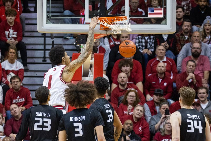 Dec 21, 2023; Bloomington, Indiana, USA; Indiana Hoosiers center Kel'el Ware (1) dunks the ball in the second half against the North Alabama Lions at Simon Skjodt Assembly Hall. Mandatory Credit: Trevor Ruszkowski-USA TODAY Sports