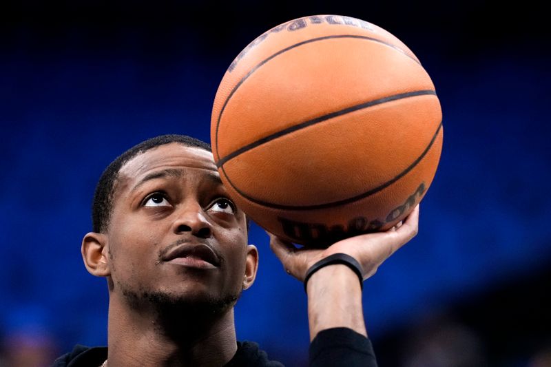 ORLANDO, FLORIDA - MARCH 23: De'Aaron Fox #5 of the Sacramento Kings warms up prior to a game /M at Kia Center on March 23, 2024 in Orlando, Florida. NOTE TO USER: User expressly acknowledges and agrees that, by downloading and or using this photograph, User is consenting to the terms and conditions of the Getty Images License Agreement. (Photo by Rich Storry/Getty Images)