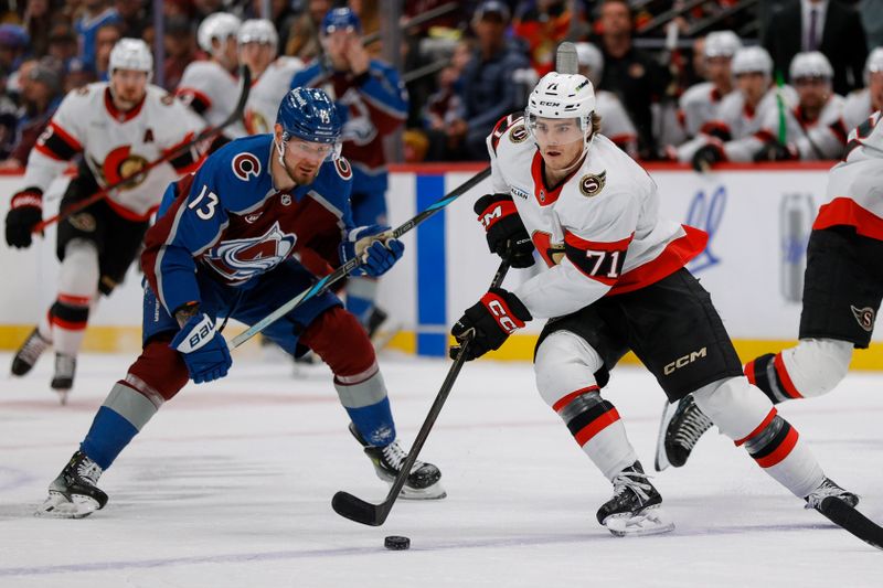 Jan 8, 2026; Denver, Colorado, USA; Ottawa Senators center Ridly Greig (71) controls the puck ahead of Colorado Avalanche right wing Valeri Nichushkin (13) in the first period at Ball Arena. Mandatory Credit: Isaiah J. Downing-Imagn Images