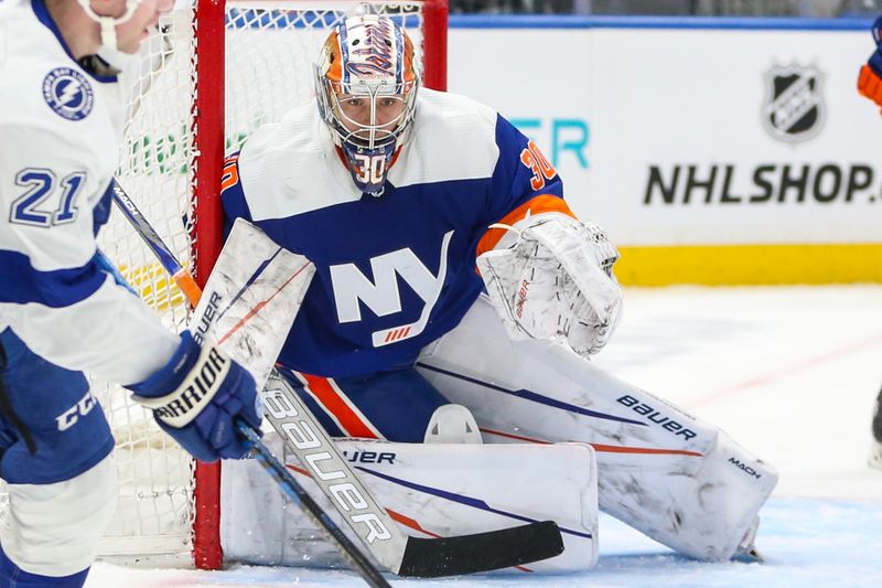 Feb 24, 2024; Elmont, New York, USA;  New York Islanders goaltender Ilya Sorokin (30) defends the net in the third period against the Tampa Bay Lightning at UBS Arena. Mandatory Credit: Wendell Cruz-USA TODAY Sports