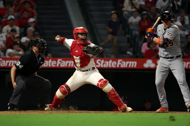 Sep 16, 2023; Anaheim, California, USA;  Los Angeles Angels catcher Logan O'Hoppe (14) throws the ball to second on a steal by Detroit Tigers center fielder Parker Meadows (22) during the tenth inning at Angel Stadium. Mandatory Credit: Kiyoshi Mio-USA TODAY Sports