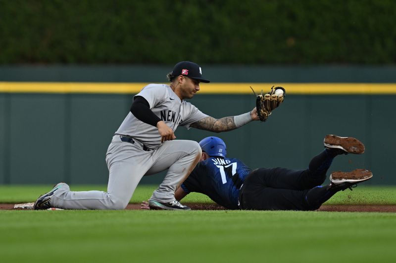 Aug 16, 2024; Detroit, Michigan, USA;  New York Yankees second baseman Gleyber Torres (25) gets ready to tag out Detroit Tigers third baseman Jace Jung (17) who was trying to steal second base in the fourth inning at Comerica Park. Mandatory Credit: Lon Horwedel-USA TODAY Sports