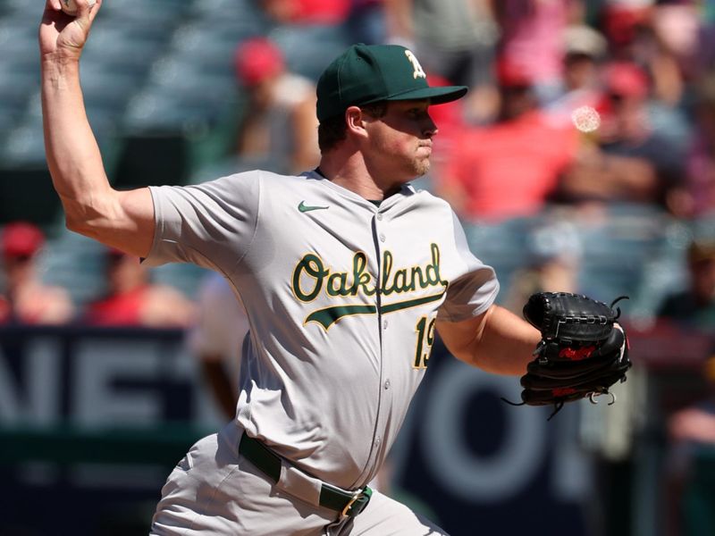 Jun 26, 2024; Anaheim, California, USA;  Oakland Athletics relief pitcher Mason Miller (19) pitches during the eighth inning against the Los Angeles Angels at Angel Stadium. Mandatory Credit: Kiyoshi Mio-USA TODAY Sports