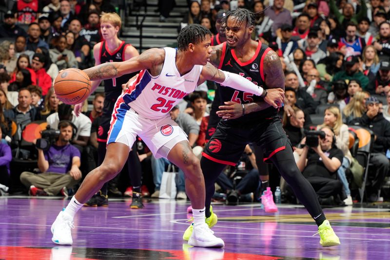 TORONTO, CANADA - NOVEMBER 15: Marcus Sasser #25 of the Detroit Pistons dribbles the ball during the game against the Toronto Raptors during the Emirates NBA CUP game  on November 15, 2024 at the Scotiabank Arena in Toronto, Ontario, Canada.  NOTE TO USER: User expressly acknowledges and agrees that, by downloading and or using this Photograph, user is consenting to the terms and conditions of the Getty Images License Agreement.  Mandatory Copyright Notice: Copyright 2024 NBAE (Photo by Mark Blinch/NBAE via Getty Images)