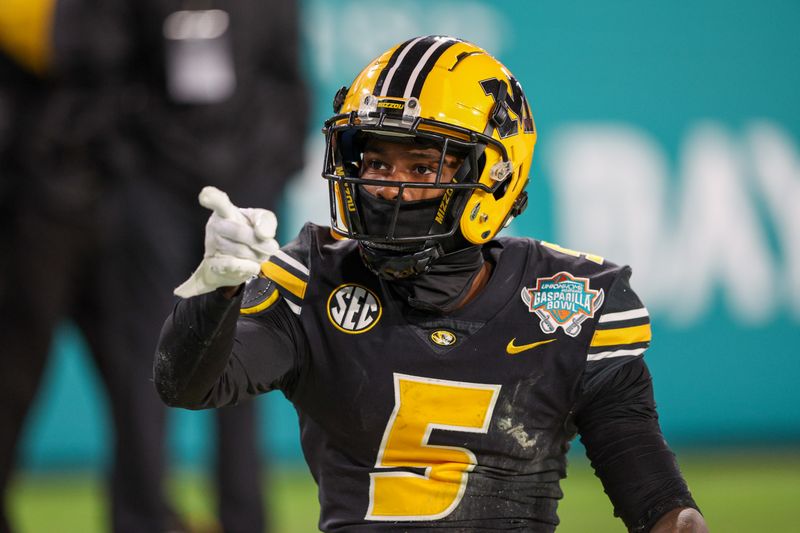 Dec 23, 2022; Tampa, Florida, USA; Missouri Tigers wide receiver Mookie Cooper (5) reacts after a play against the Missouri Tigers in the third quarter in the 2022 Gasparilla Bowl at Raymond James Stadium. Mandatory Credit: Nathan Ray Seebeck-USA TODAY Sports