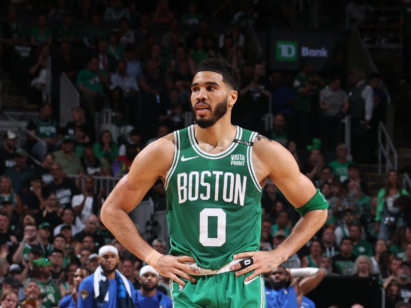 BOSTON, MA - JUNE 17: Jayson Tatum #0 of the Boston Celtics looks on during the game against the Dallas Mavericks during Game 5 of the 2024 NBA Finals on June 17, 2024 at the TD Garden in Boston, Massachusetts. NOTE TO USER: User expressly acknowledges and agrees that, by downloading and or using this photograph, User is consenting to the terms and conditions of the Getty Images License Agreement. Mandatory Copyright Notice: Copyright 2024 NBAE  (Photo by Nathaniel S. Butler/NBAE via Getty Images)