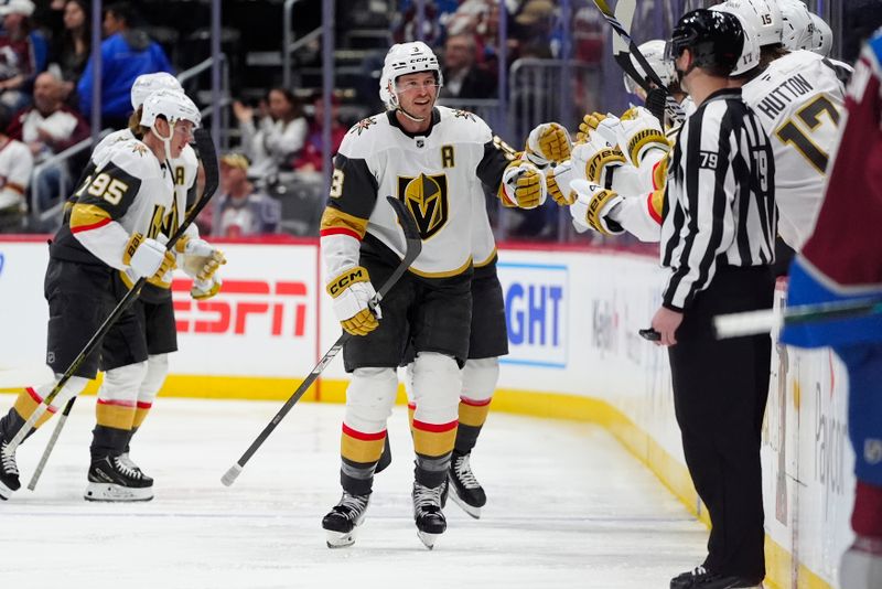 Apr 8, 2025; Denver, Colorado, USA; Vegas Golden Knights defenseman Brayden McNabb (3) celebrates his goal scored in the second period against the Vegas Golden Knights at Ball Arena. Mandatory Credit: Ron Chenoy-Imagn Images