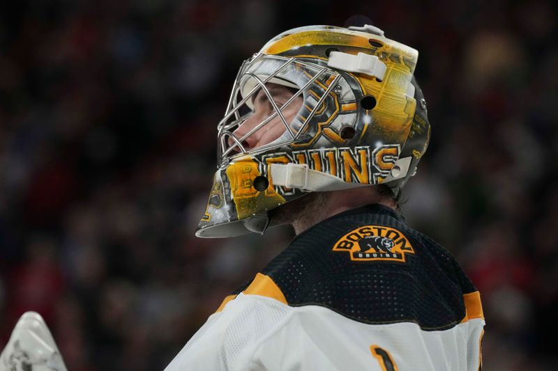 Mar 26, 2023; Raleigh, North Carolina, USA;  Boston Bruins goaltender Jeremy Swayman (1) looks on against the Carolina Hurricanes during the third period at PNC Arena. Mandatory Credit: James Guillory-USA TODAY Sports