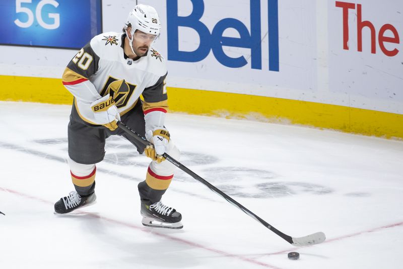 Feb 24, 2024; Ottawa, Ontario, CAN; Vegas Golden Knights center Chandler Stephenson (20) skates with the puck in the third period  against the Ottawa Senators at the Canadian Tire Centre. Mandatory Credit: Marc DesRosiers-USA TODAY Sports