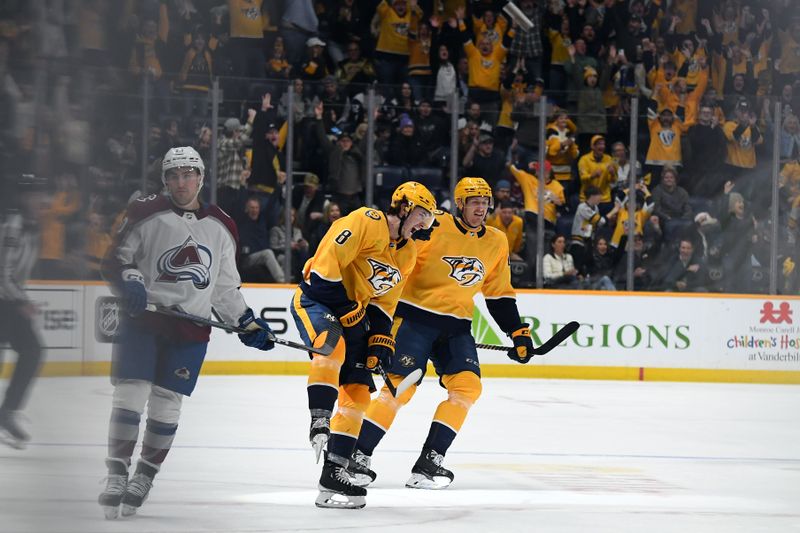 Mar 2, 2024; Nashville, Tennessee, USA; Nashville Predators center Cody Glass (8) celebrates after scoring his third goal of the game during the third period against the Colorado Avalanche at Bridgestone Arena. Mandatory Credit: Christopher Hanewinckel-USA TODAY Sports