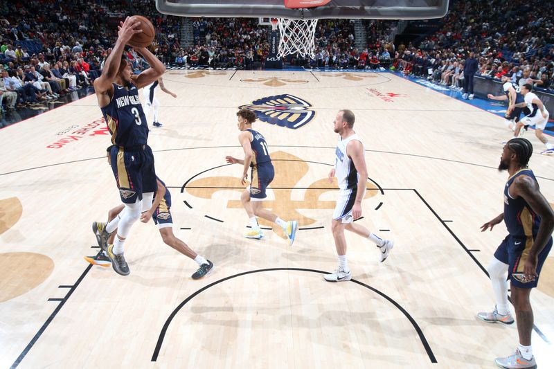 NEW ORLEANS, LA - APRIL 3:  CJ McCollum #3 of the New Orleans Pelicans grabs a rebound during the game against the Orlando Magic on April 3, 2024 at the Smoothie King Center in New Orleans, Louisiana. NOTE TO USER: User expressly acknowledges and agrees that, by downloading and or using this Photograph, user is consenting to the terms and conditions of the Getty Images License Agreement. Mandatory Copyright Notice: Copyright 2024 NBAE (Photo by Layne Murdoch Jr./NBAE via Getty Images)