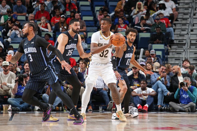 NEW ORLEANS, LA - OCTOBER 10: EJ Liddell #32 of the New Orleans Pelicans handles the ball during the game against the Orlando Magic on October 10, 2023 at the Smoothie King Center in New Orleans, Louisiana. NOTE TO USER: User expressly acknowledges and agrees that, by downloading and or using this Photograph, user is consenting to the terms and conditions of the Getty Images License Agreement. Mandatory Copyright Notice: Copyright 2023 NBAE (Photo by Layne Murdoch Jr./NBAE via Getty Images)