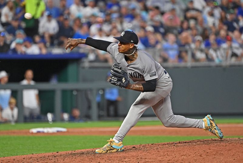 Jun 11, 2024; Kansas City, Missouri, USA; New York Yankees starting pitcher Marcus Stroman (0) delivers a pitch in the sixth inning against the Kansas City Royals at Kauffman Stadium. Mandatory Credit: Peter Aiken-USA TODAY Sports