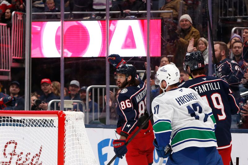 Jan 15, 2026; Columbus, Ohio, USA; Columbus Blue Jackets right wing Kirill Marchenko (86) celebrates his goal against the Vancouver Canucks during the second period at Nationwide Arena. Mandatory Credit: Russell LaBounty-Imagn Images