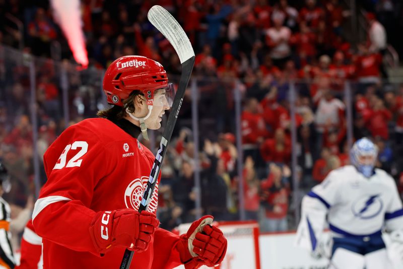 Jan 25, 2025; Detroit, Michigan, USA;  Detroit Red Wings center Marco Kasper (92) celebrates after scoring in the second period against the Tampa Bay Lightning at Little Caesars Arena. Mandatory Credit: Rick Osentoski-Imagn Images