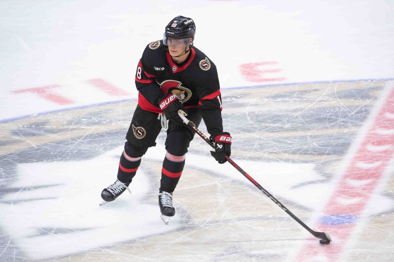 Oct 19, 2024; Ottawa, Ontario, CAN; Ottawa Senators center Tim Stutzle (18) skates with the puck in the third period against the Tampa Bay Lightning at the Canadian Tire Centre. Mandatory Credit: Marc DesRosiers-Imagn Images