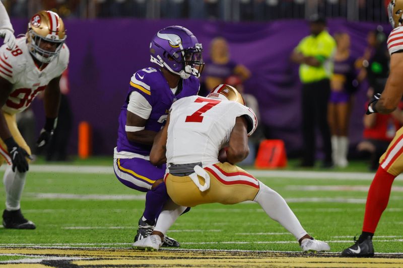 San Francisco 49ers cornerback Charvarius Ward (7) intercepts a pass intended for Minnesota Vikings wide receiver Jordan Addison (3) during the first half of an NFL football game, Monday, Oct. 23, 2023, in Minneapolis. (AP Photo/Bruce Kluckhohn)