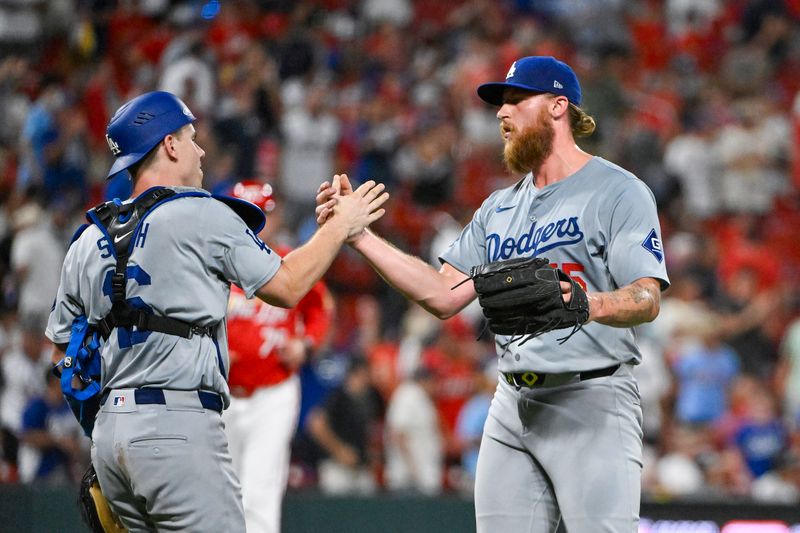 Aug 16, 2024; St. Louis, Missouri, USA;  Los Angeles Dodgers relief pitcher Michael Kopech (45) celebrates with catcher Will Smith (16) after the Dodgers defeated the St. Louis Cardinals at Busch Stadium. Mandatory Credit: Jeff Curry-USA TODAY Sports