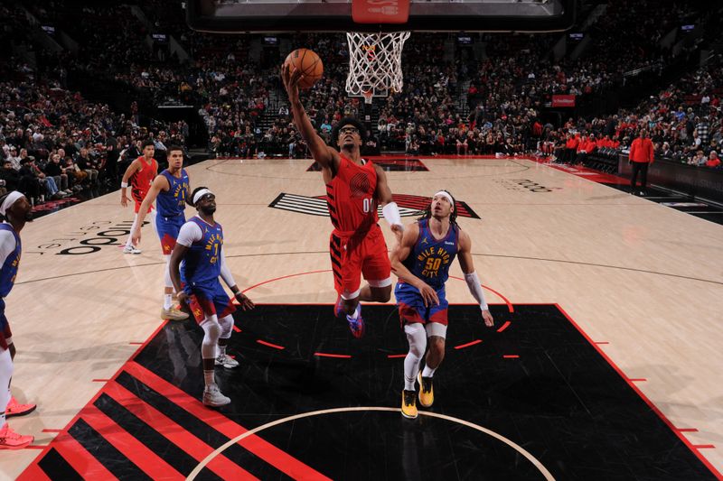 PORTLAND, OR - MARCH 23: Scoot Henderson #00 of the Portland Trail Blazers drives to the basket during the game against the Denver Nuggets on March 23, 2024 at the Moda Center Arena in Portland, Oregon. NOTE TO USER: User expressly acknowledges and agrees that, by downloading and or using this photograph, user is consenting to the terms and conditions of the Getty Images License Agreement. Mandatory Copyright Notice: Copyright 2024 NBAE (Photo by Cameron Browne/NBAE via Getty Images)