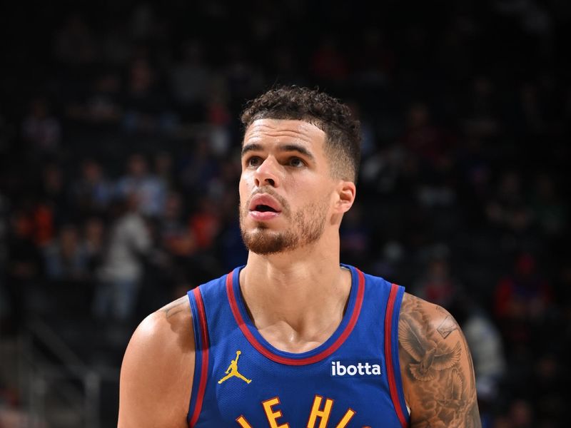 DETROIT, MI - FEBRUARY 28: Michael Porter Jr. #1 of the Denver Nuggets shoots a free throw during the game against the Detroit Pistons on February 28, 2025 at Little Caesars Arena in Detroit, Michigan. NOTE TO USER: User expressly acknowledges and agrees that, by downloading and/or using this photograph, User is consenting to the terms and conditions of the Getty Images License Agreement. Mandatory Copyright Notice: Copyright 2025 NBAE (Photo by Chris Schwegler/NBAE via Getty Images)