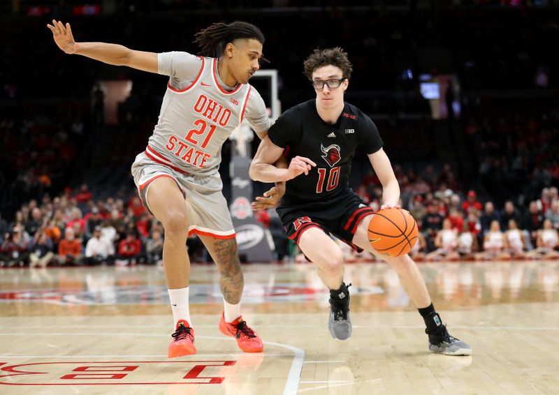 Jan 3, 2024; Columbus, Ohio, USA; Rutgers Scarlet Knights guard Gavin Griffiths (10) controls the ball as Ohio State Buckeyes forward Devin Royal (21) defends during the first half at Value City Arena. Mandatory Credit: Joseph Maiorana-USA TODAY Sports