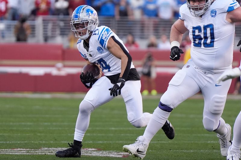 Detroit Lions wide receiver Amon-Ra St. Brown (14) runs against the San Francisco 49ers during the first half of the NFC Championship NFL football game in Santa Clara, Calif., Sunday, Jan. 28, 2024. (AP Photo/Mark J. Terrill)