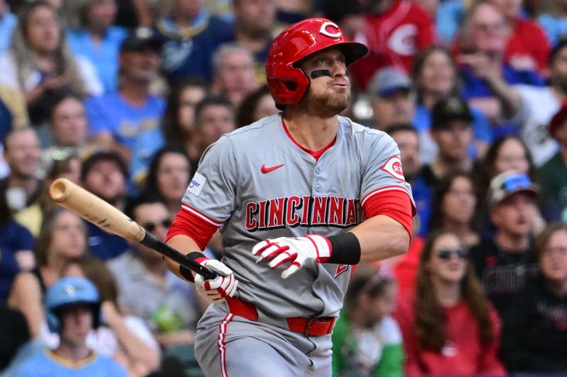 Jun 14, 2024; Milwaukee, Wisconsin, USA; Cincinnati Reds center fielder TJ Friedl (29) hits a solo home run in the third inning against the Milwaukee Brewers at American Family Field. Mandatory Credit: Benny Sieu-USA TODAY Sports