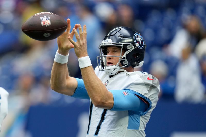 Tennessee Titans quarterback Ryan Tannehill warms up before an NFL football game against the Indianapolis Colts, Sunday, Oct. 8, 2023, in Indianapolis. (AP Photo/Michael Conroy)