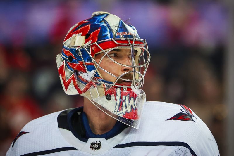 Mar 18, 2024; Calgary, Alberta, CAN; Washington Capitals goaltender Charlie Lindgren (79) against the Calgary Flames during the second period at Scotiabank Saddledome. Mandatory Credit: Sergei Belski-USA TODAY Sports