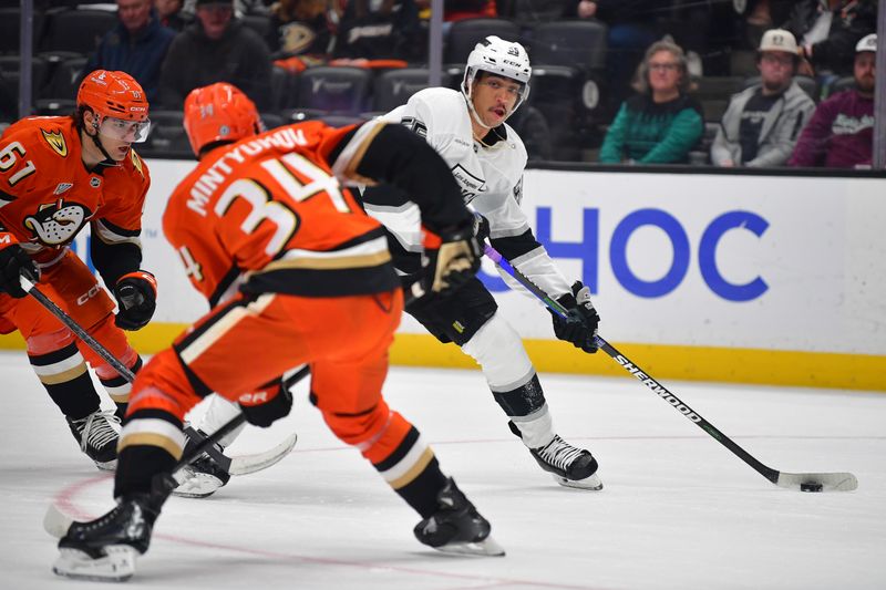 Nov 29, 2024; Anaheim, California, USA; Los Angeles Kings right wing Quinton Byfield (55) moves in for a shot against the Anaheim Ducks during the first period at Honda Center. Mandatory Credit: Gary A. Vasquez-Imagn Images