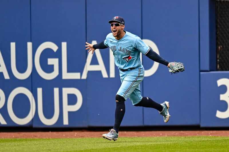 Jun 4, 2023; New York City, New York, USA; Toronto Blue Jays right fielder George Springer (4) reacts after catching a deep fly ball for the final out against the New York Mets at Citi Field. Mandatory Credit: John Jones-USA TODAY Sports