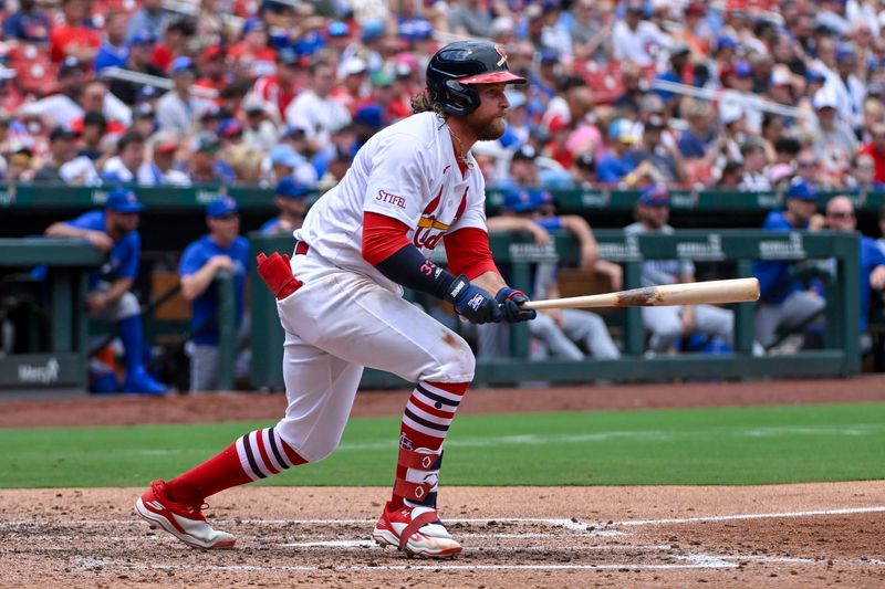 Jul 14, 2024; St. Louis, Missouri, USA;  St. Louis Cardinals left fielder Brendan Donovan (33) hits a single against the Chicago Cubs during the fourth inning at Busch Stadium. Mandatory Credit: Jeff Curry-USA TODAY Sports