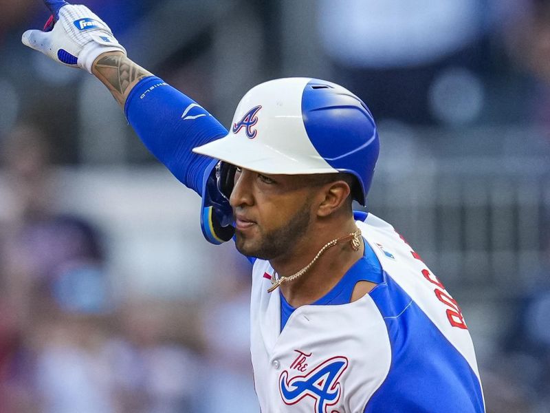 Jul 29, 2023; Cumberland, Georgia, USA; Atlanta Braves left fielder Eddie Rosario (8) reacts after hitting a two run home run against the Milwaukee Brewers during the first inning at Truist Park. Mandatory Credit: Dale Zanine-USA TODAY Sports