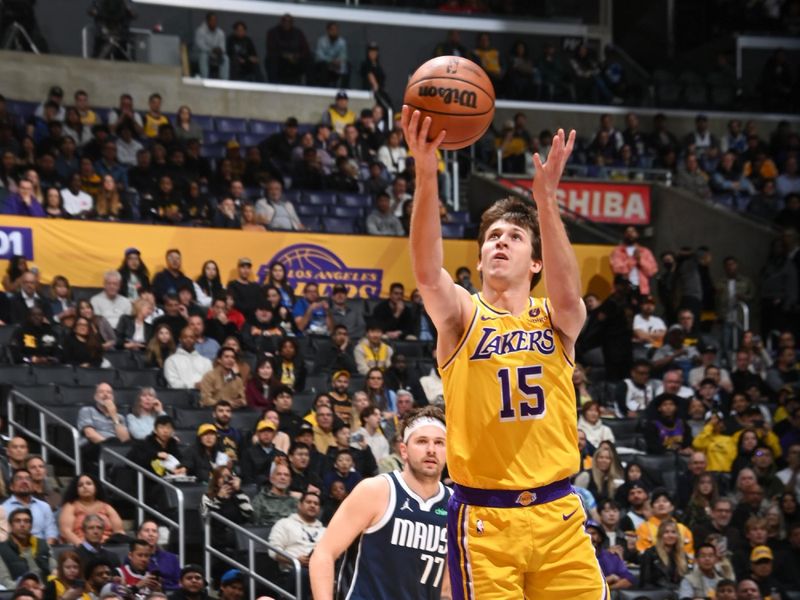 LOS ANGELES, CA - JANUARY 17:  Austin Reaves #15 of the Los Angeles Lakers goes to the basket during the game on January 17, 2024 at Crypto.Com Arena in Los Angeles, California. NOTE TO USER: User expressly acknowledges and agrees that, by downloading and/or using this Photograph, user is consenting to the terms and conditions of the Getty Images License Agreement. Mandatory Copyright Notice: Copyright 2024 NBAE (Photo by Andrew D. Bernstein/NBAE via Getty Images)