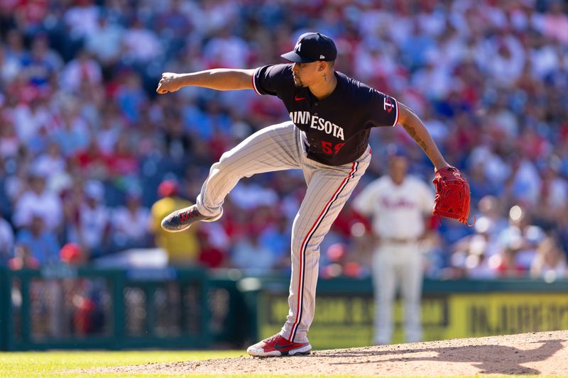 Aug 13, 2023; Philadelphia, Pennsylvania, USA; Minnesota Twins relief pitcher Jhoan Duran (59) throws a pitch during the ninth inning against the Philadelphia Phillies at Citizens Bank Park. Mandatory Credit: Bill Streicher-USA TODAY Sports