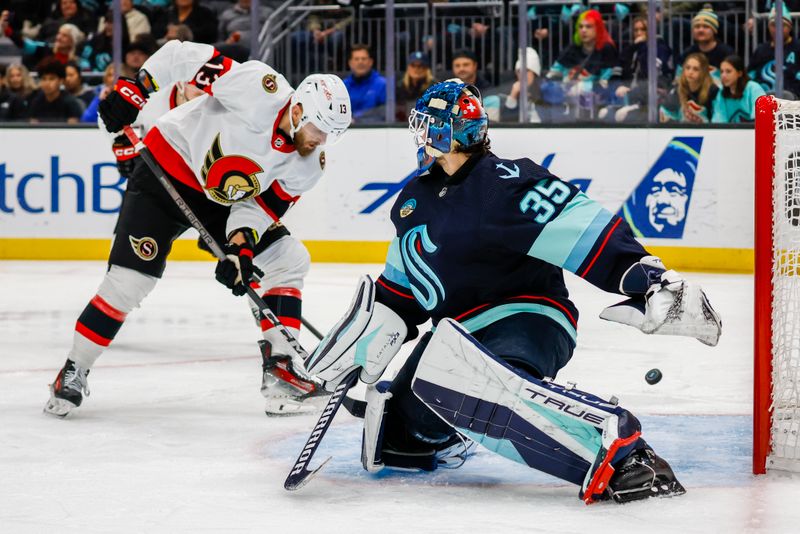 Jan 4, 2024; Seattle, Washington, USA; Ottawa Senators left wing Jiri Smejkal (13) misses a shot against Seattle Kraken goaltender Joey Daccord (35) during the third period at Climate Pledge Arena. Mandatory Credit: Joe Nicholson-USA TODAY Sports