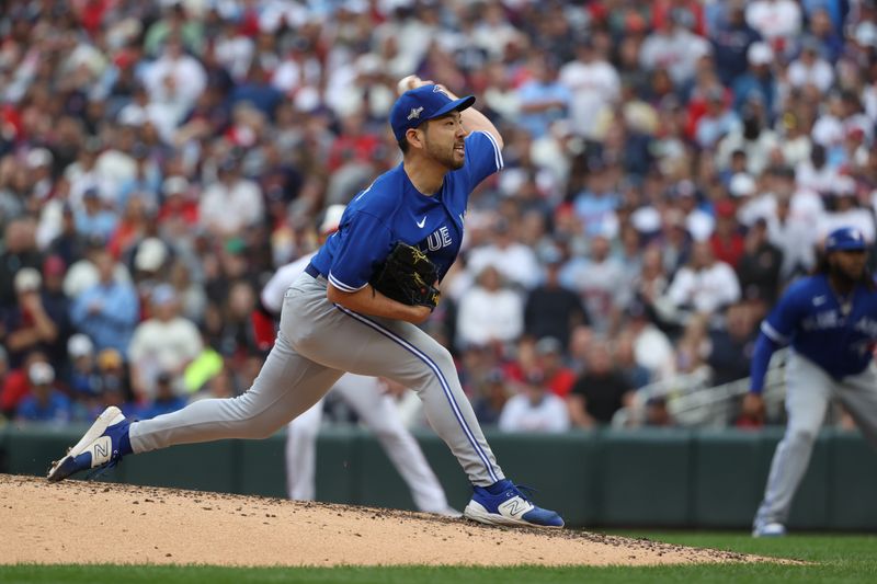 Oct 4, 2023; Minneapolis, Minnesota, USA; Toronto Blue Jays starting pitcher Yusei Kikuchi (16) delivers a pitch in in the fourth inning against the Minnesota Twins during game two of the Wildcard series for the 2023 MLB playoffs at Target Field. Mandatory Credit: Jesse Johnson-USA TODAY Sports