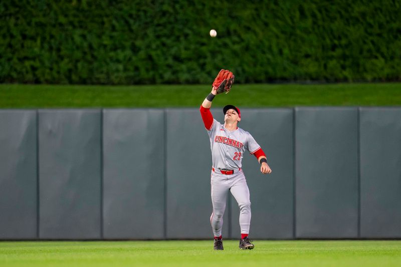 Sep 13, 2024; Minneapolis, Minnesota, USA; Cincinnati Reds center fielder TJ Friedl (29) catches a fly ball against the Minnesota Twins in the fifth inning at Target Field. Mandatory Credit: Jesse Johnson-Imagn Images