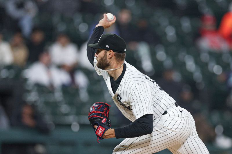 May 20, 2025; Chicago, Illinois, USA; Chicago White Sox starting pitcher Adrian Houser (57) delivers a pitch against the Seattle Mariners during the second inning at Rate Field. Mandatory Credit: Kamil Krzaczynski-Imagn Images