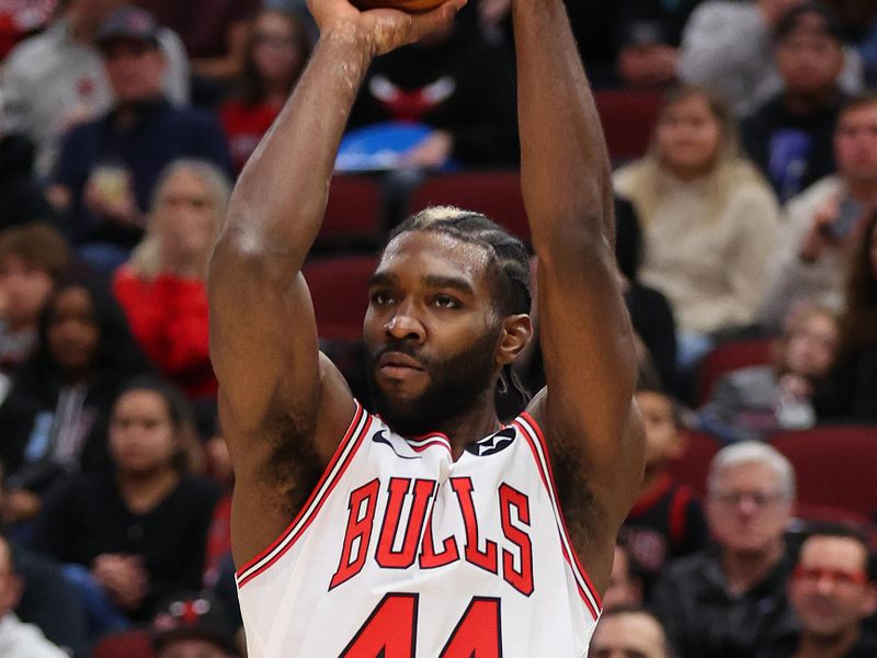 CHICAGO, ILLINOIS - NOVEMBER 06: Patrick Williams #44 of the Chicago Bulls shoots a three pointer against the Utah Jazz during the first half at the United Center on November 06, 2023 in Chicago, Illinois. NOTE TO USER: User expressly acknowledges and agrees that, by downloading and or using this photograph, User is consenting to the terms and conditions of the Getty Images License Agreement. (Photo by Michael Reaves/Getty Images)