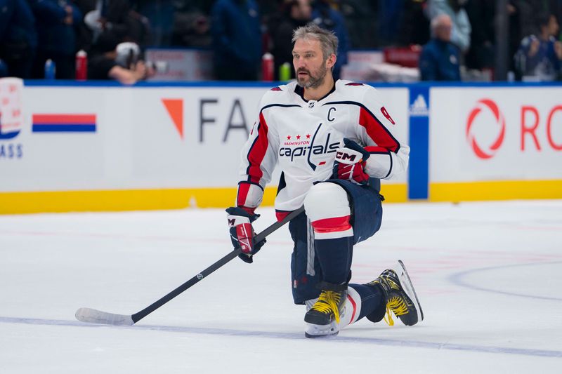 Mar 16, 2024; Vancouver, British Columbia, CAN; Washington Capitals forward Alex Ovechkin (8) rests during warm up prior to a game against the Vancouver Canucks at Rogers Arena.  Mandatory Credit: Bob Frid-USA TODAY Sports