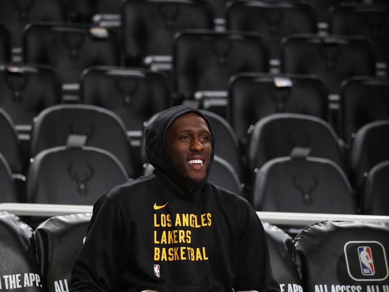 MILWAUKEE, WI - MARCH 26: Taurean Prince #12 of the Los Angeles Lakers warms up before the game against the Milwaukee Bucks on March 26, 2024 at the Fiserv Forum Center in Milwaukee, Wisconsin. NOTE TO USER: User expressly acknowledges and agrees that, by downloading and or using this Photograph, user is consenting to the terms and conditions of the Getty Images License Agreement. Mandatory Copyright Notice: Copyright 2024 NBAE (Photo by Gary Dineen/NBAE via Getty Images).