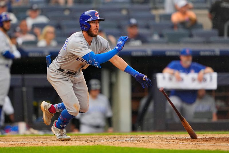 Jul 8, 2023; Bronx, New York, USA; Chicago Cubs third baseman Miles Mastrobuoni (20) runs out a single against the New York Yankees during the eighth inning at Yankee Stadium. Mandatory Credit: Gregory Fisher-USA TODAY Sports