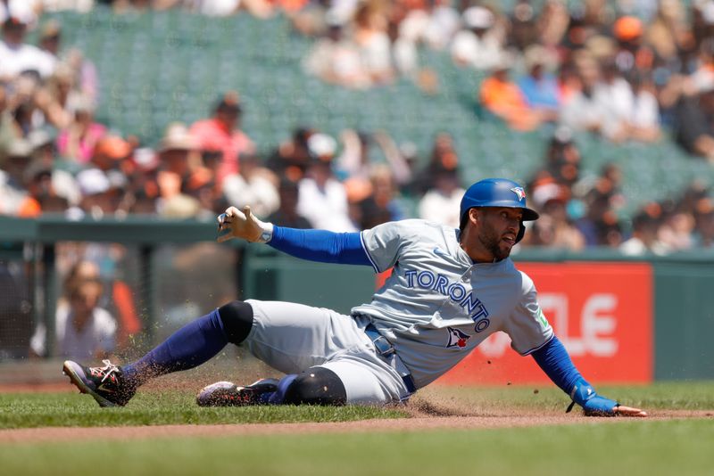 Jul 11, 2024; San Francisco, California, USA; Toronto Blue Jays outfielder George Springer (4) slips running during the first inning against the San Francisco Giants at Oracle Park. Mandatory Credit: Sergio Estrada-USA TODAY Sports