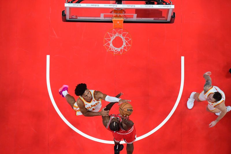 ATLANTA, GA - NOVEMBER 9: Jalen Johnson #1 of the Atlanta Hawks blocks the shot during the game against the Chicago Bulls on November 9, 2024 at State Farm Arena in Atlanta, Georgia.  NOTE TO USER: User expressly acknowledges and agrees that, by downloading and/or using this Photograph, user is consenting to the terms and conditions of the Getty Images License Agreement. Mandatory Copyright Notice: Copyright 2024 NBAE (Photo by Adam Hagy/NBAE via Getty Images)