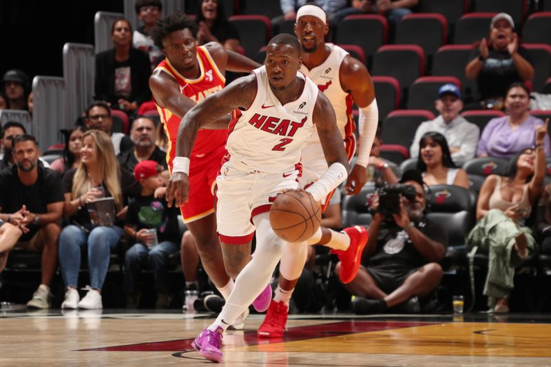 MIAMI, FL - OCTOBER 16: Terry Rozier #2 of the Miami Heat dribbles the ball during the game against the Atlanta Hawks on October 16, 2024 at Miami-Dade Arena in Miami, Florida. NOTE TO USER: User expressly acknowledges and agrees that, by downloading and or using this Photograph, user is consenting to the terms and conditions of the Getty Images License Agreement. Mandatory Copyright Notice: Copyright 2024 NBAE (Photo by Issac Baldizon/NBAE via Getty Images)