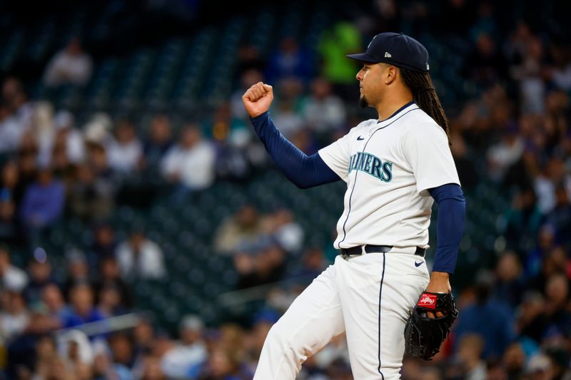 Apr 2, 2024; Seattle, Washington, USA; Seattle Mariners starting pitcher Luis Castillo (58) reacts following a strikeout  to end the top of the third inning at T-Mobile Park. Mandatory Credit: Joe Nicholson-USA TODAY Sports