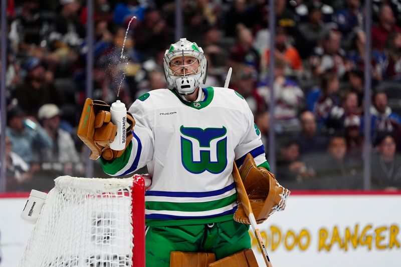 Oct 23, 2025; Denver, Colorado, USA; Carolina Hurricanes goaltender Frederik Andersen (31) during the second period against the Colorado Avalanche  at Ball Arena. Mandatory Credit: Ron Chenoy-Imagn Images