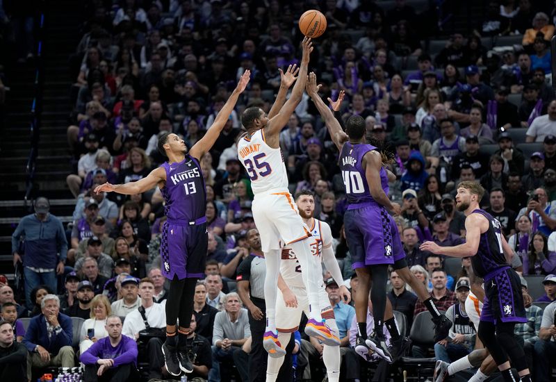 SACRAMENTO, CALIFORNIA - APRIL 12: Kevin Durant #35 of the Phoenix Suns shoots over Harrison Barnes #40 and Keegan Murray #13 of the Sacramento Kings during the second half of an NBA basketball game at Golden 1 Center on April 12, 2024 in Sacramento, California. NOTE TO USER: User expressly acknowledges and agrees that, by downloading and or using this photograph, User is consenting to the terms and conditions of the Getty Images License Agreement. (Photo by Thearon W. Henderson/Getty Images)