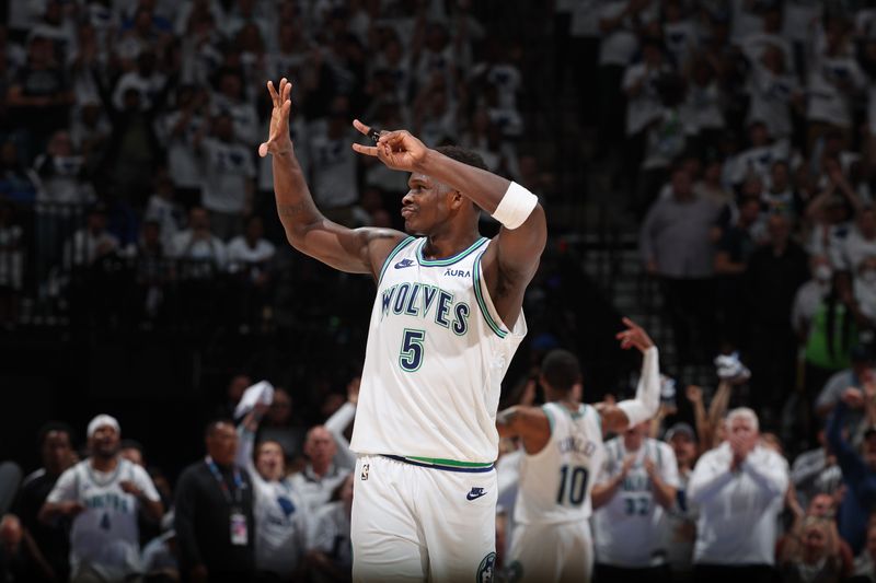 MINNEAPOLIS, MN - MAY 16: Anthony Edwards #5 of the Minnesota Timberwolves celebrates during Round 2 Game 6 of the 2024 NBA Playoffs against the Denver Nuggets on May 16, 2024 at Target Center in Minneapolis, Minnesota. NOTE TO USER: User expressly acknowledges and agrees that, by downloading and or using this Photograph, user is consenting to the terms and conditions of the Getty Images License Agreement. Mandatory Copyright Notice: Copyright 2024 NBAE (Photo by David Sherman/NBAE via Getty Images)